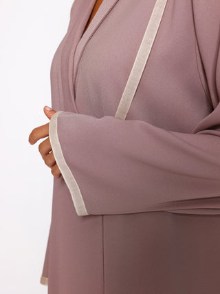 Close up of cotton weave ribbon trim on abaya neckline