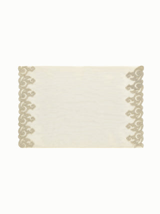 Metallic gold placemat styled for elegant table setting