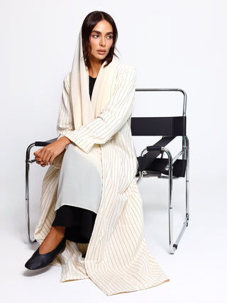 Detail view of vertical stripe pattern on cotton abaya