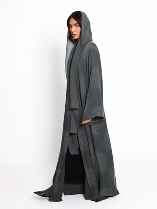 Timeless silk abaya with fluid drape for modern modest fashion