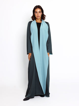 Detail view of satin and matte sides of reversible abaya