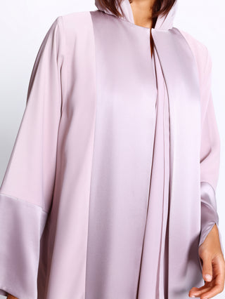 Detail view of tonal paneling on silk satin abaya