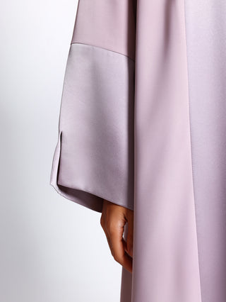 Detail view of tonal paneling on silk satin abaya